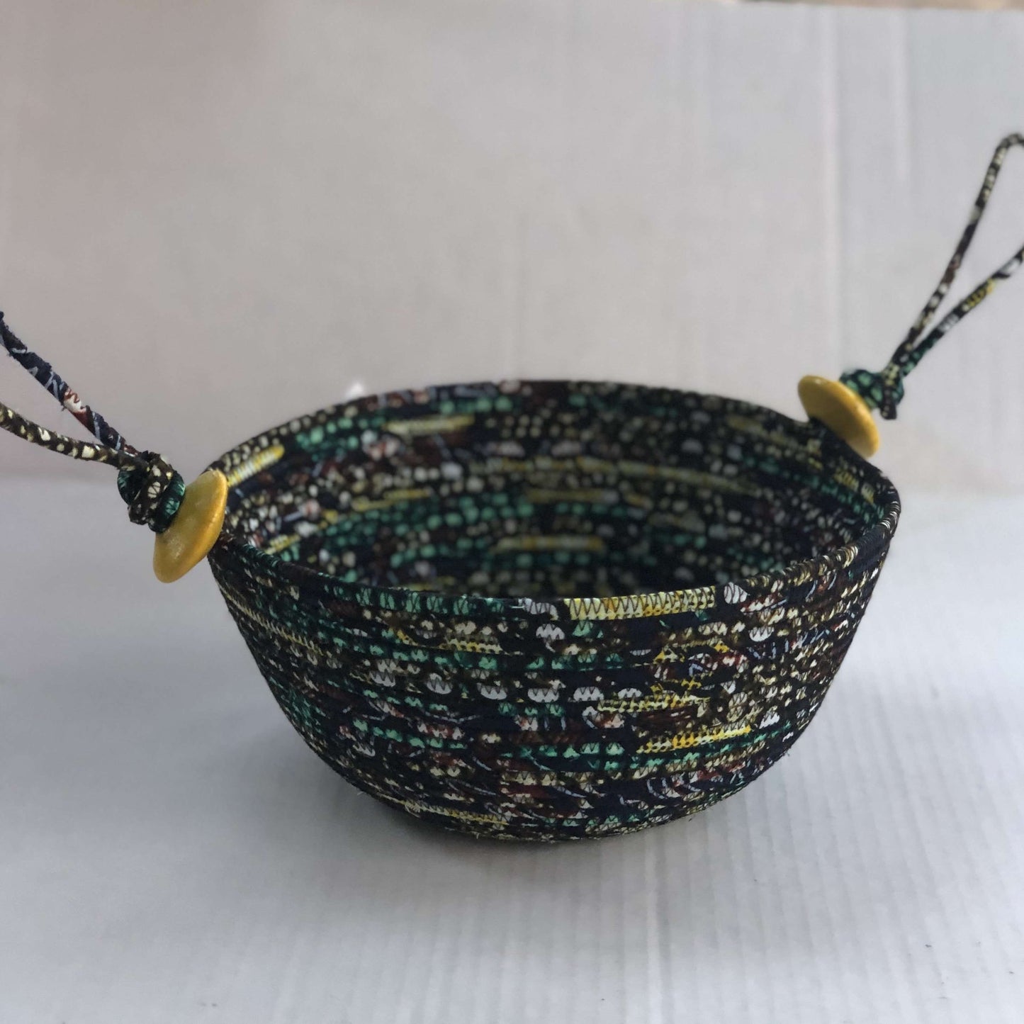 injeenyuhs hand woven lime, yellow and black with yellow bead basket